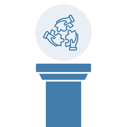 Blue icon of three hands connecting puzzle pieces, displayed on a pedestal, inside a light blue circle.